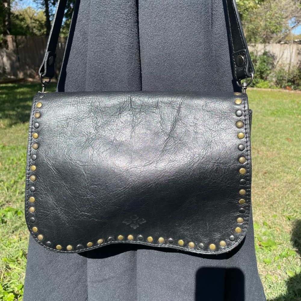 Patricia Nash Black and Gold Shoulder Bag with Structured Design